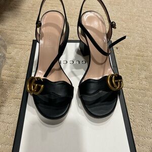 Gucci Black Heels with Gold Accents